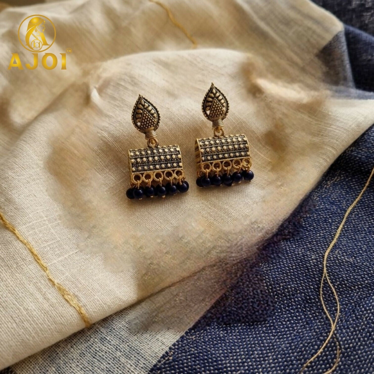 Antique Gold-Plated Leaf Design Jhumka Earrings with Blue Beads