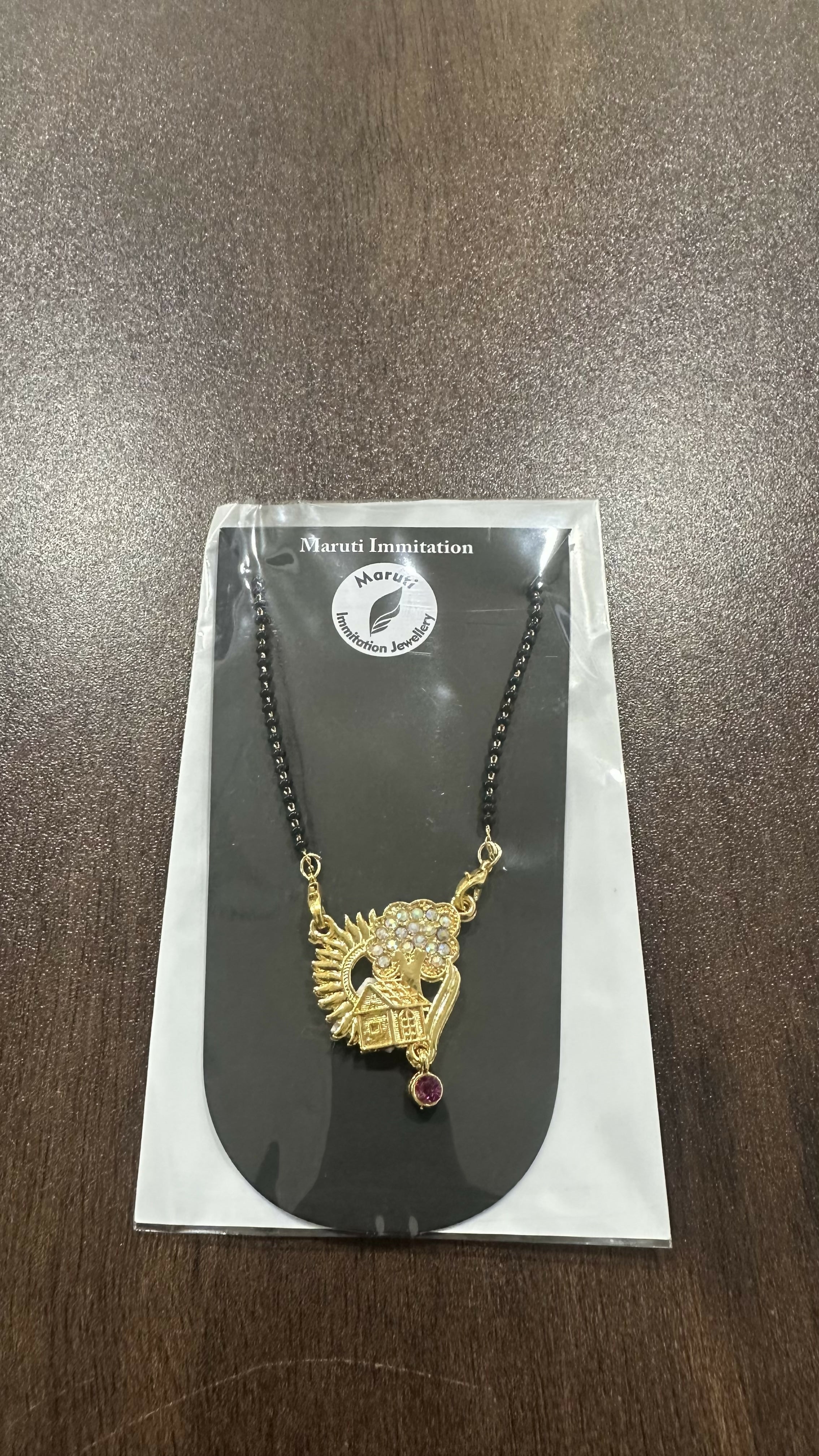 Gold-Tone Traditional Mangalsutra with Peacock-Inspired Stone Pendant