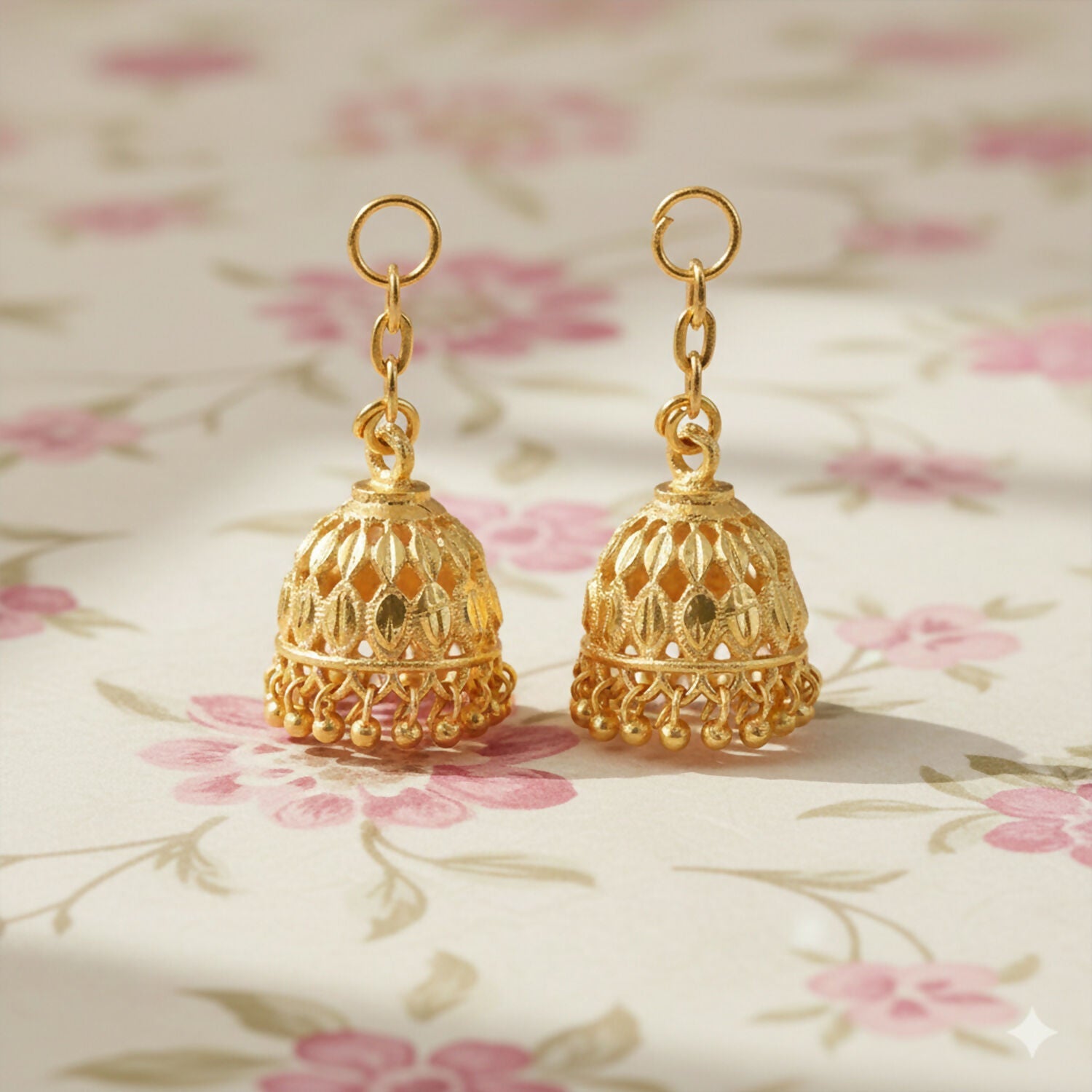 Traditional Gold-Finish Jhumka with Intricate Cutwork Design