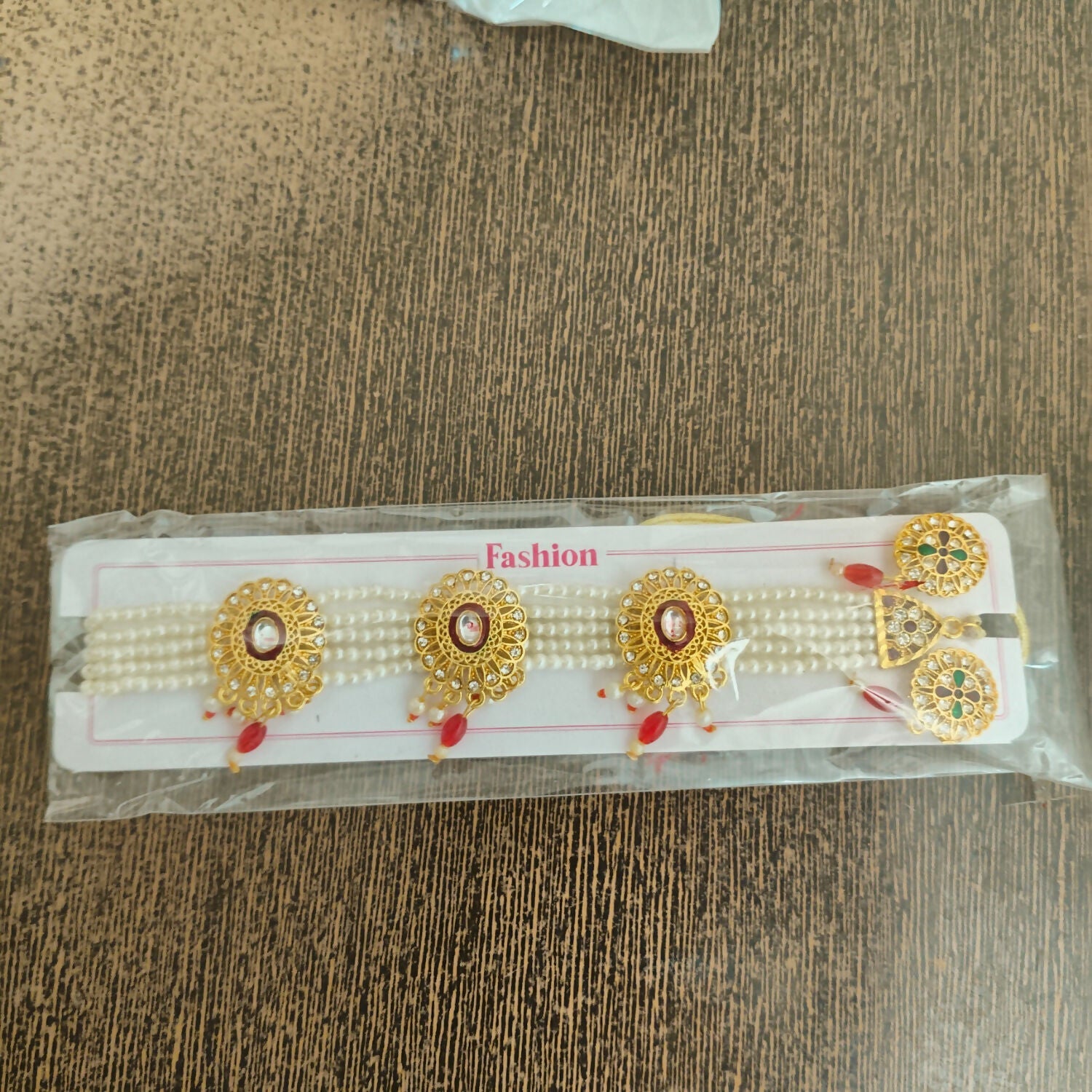 Traditional Gold-Plated Kundan Pearl Choker Necklace Set with Emerald red Drops and Matching Earrings