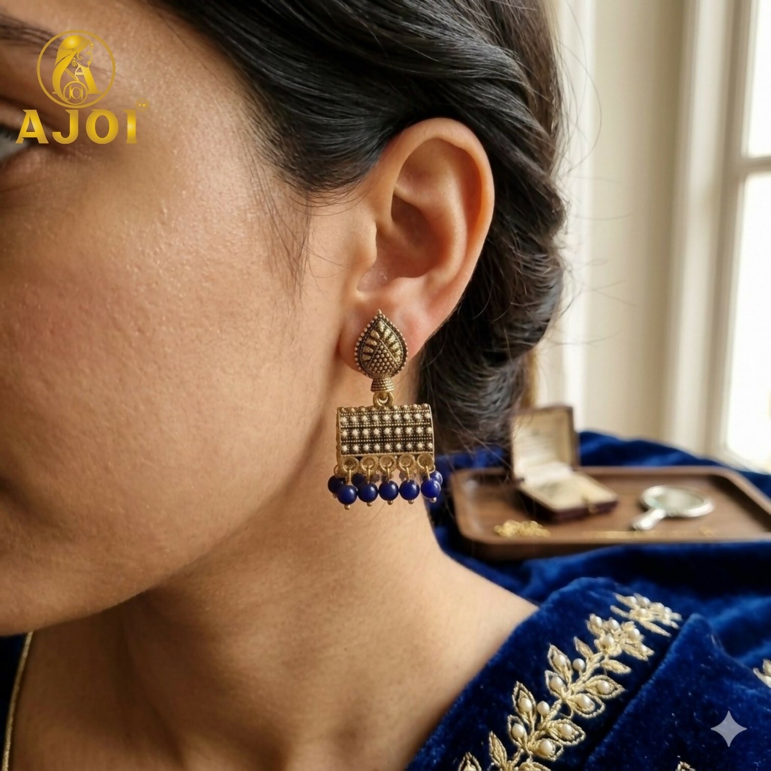 Antique Gold-Plated Leaf Design Jhumka Earrings with Blue Beads