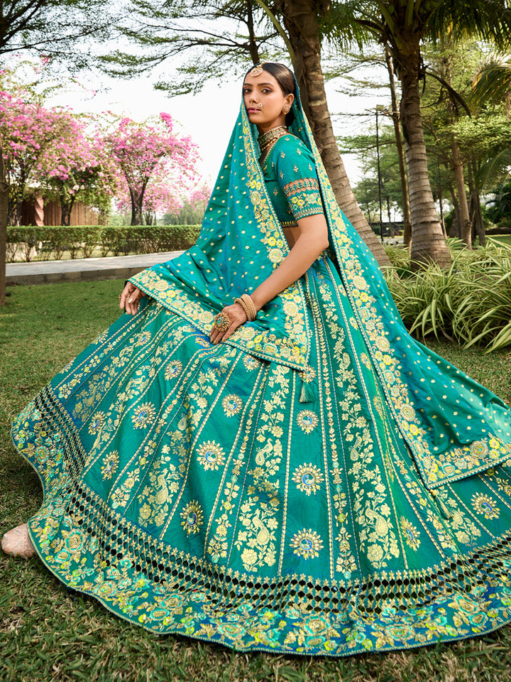 Teal Banarasi Silk Heavy Embroidered Cut Work Semi Stitched Lehenga Choli - qivii