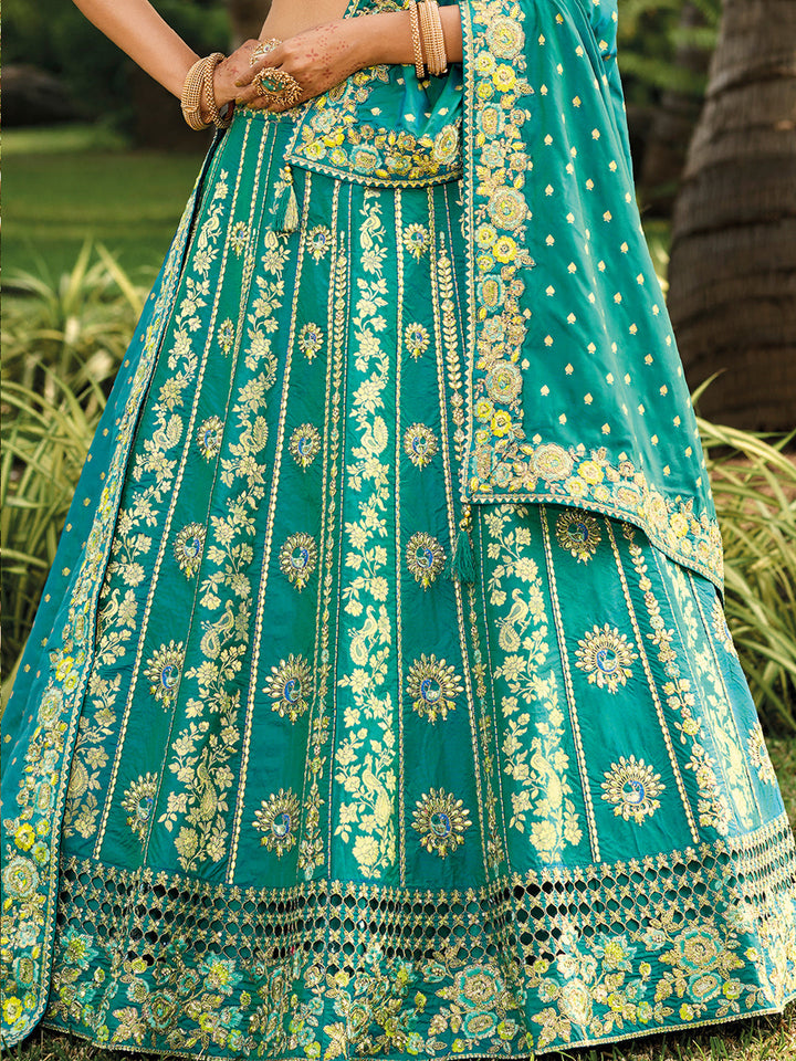 Teal Banarasi Silk Heavy Embroidered Cut Work Semi Stitched Lehenga Choli - qivii