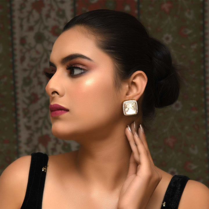 Gold plated kundan tops with Jasmit diamond and polki stone detailing