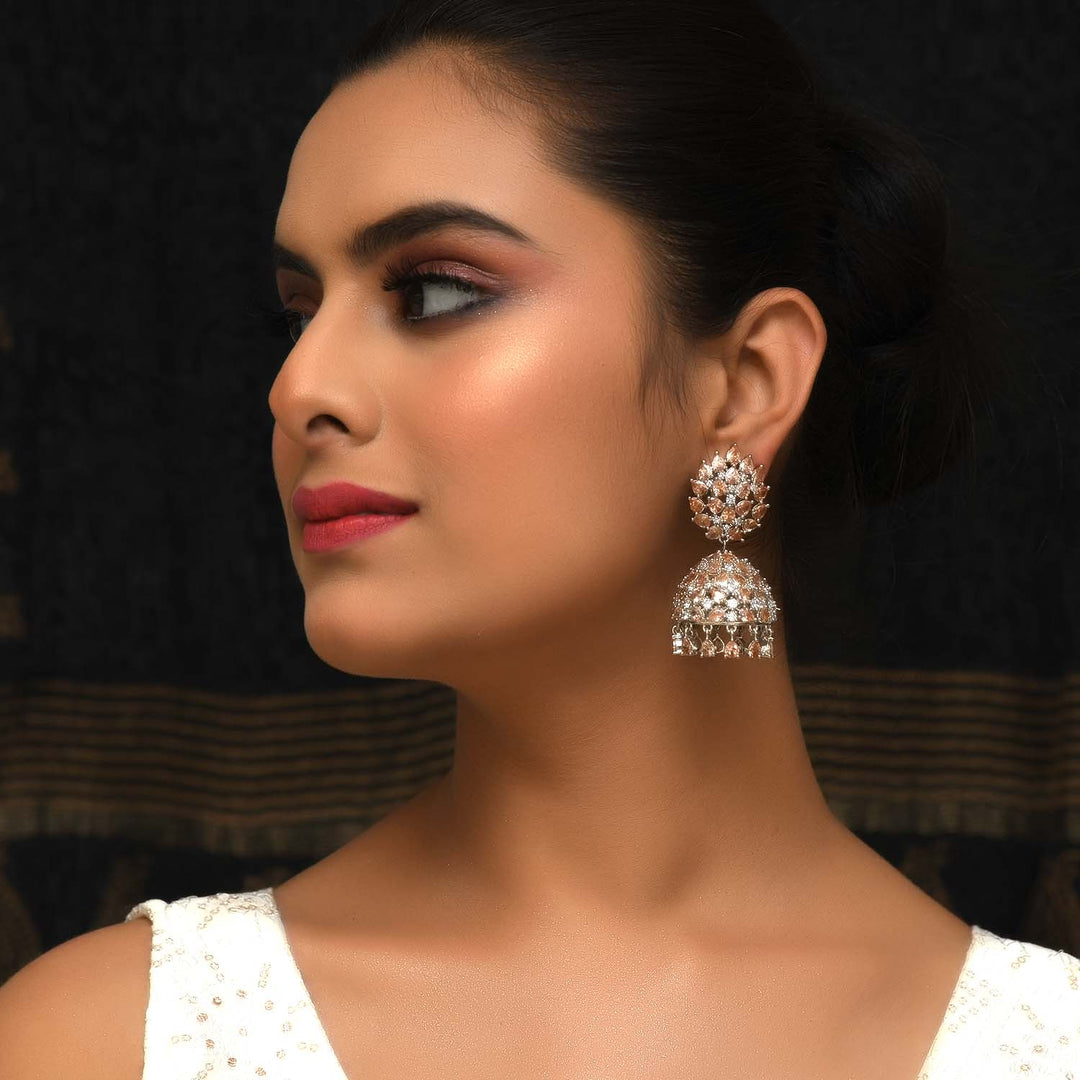 Jharna Copper Silver Plated American Diamond Jhumki with Beautiful American Diamond And Pear Shape Copper Colour Stone Western Jhumkas description:

Beautiful silver plated jhumki with American diamond and copper color stone