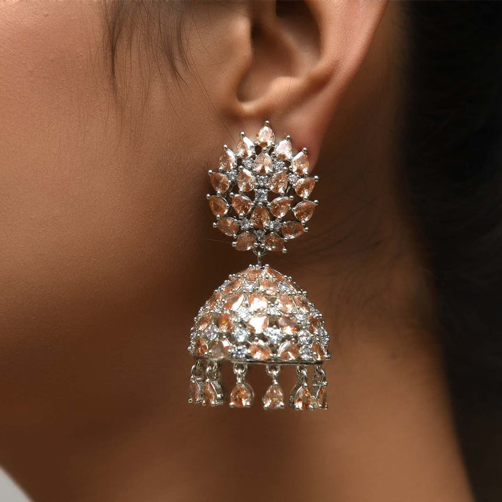 Elegant jhumka earrings with silver plating, American diamond, and copper stone