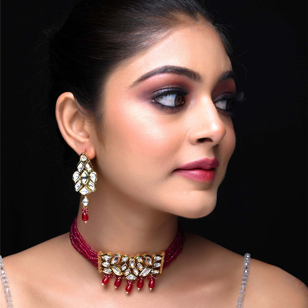 Gold choker necklace with Kundan and ruby beads for women