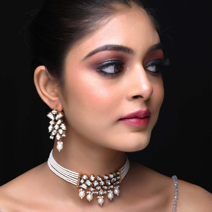 Beautiful Kundan choker with white pearls and drop shape white pearl hangings