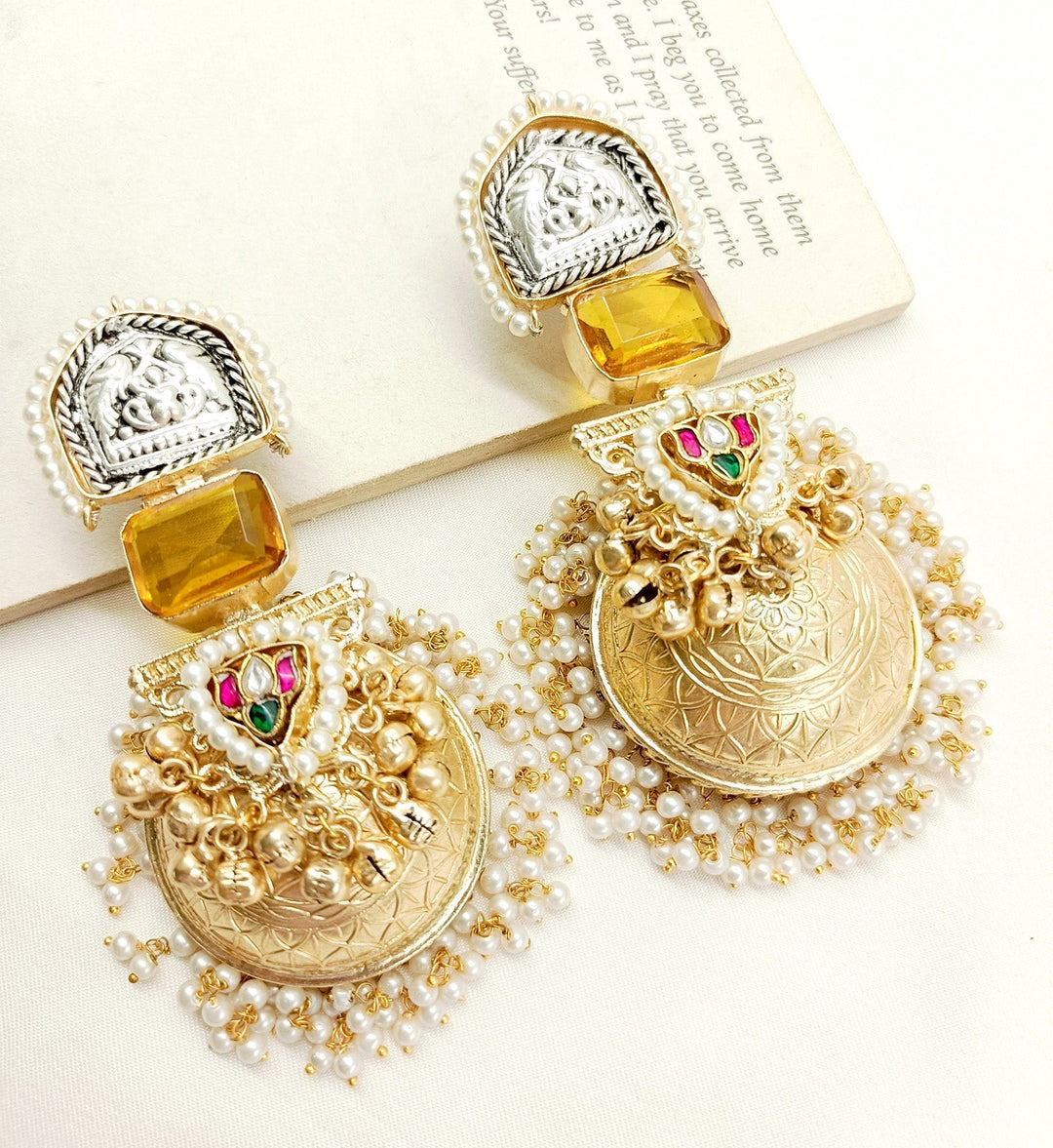 Gold plated brass metal jhumkis with kundan stones and pearl hanging 