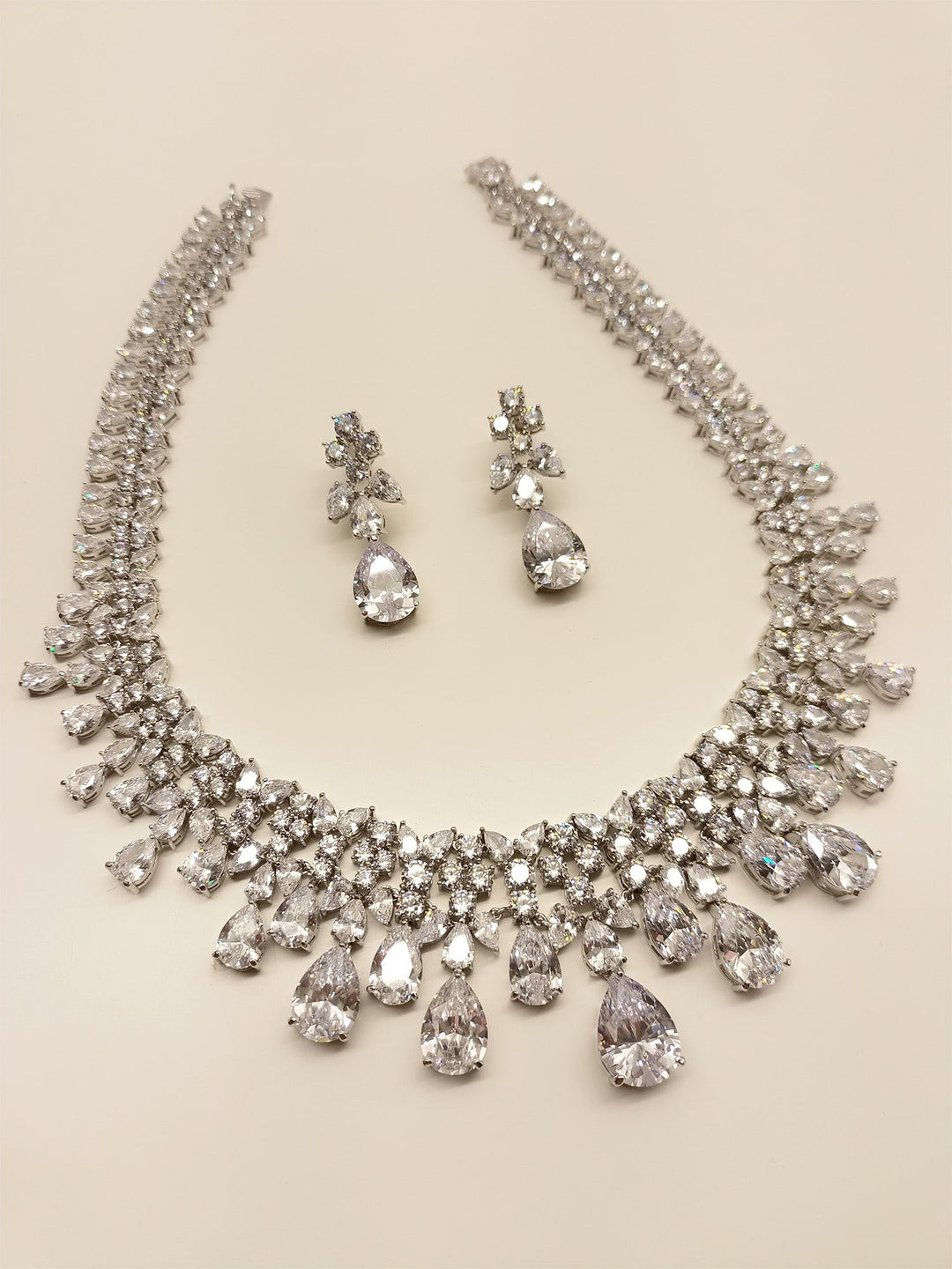 Elegant American Diamond Necklace Set with silver plated brass metal, emanating undeniable sparkle and brilliance, perfect for any special occasion