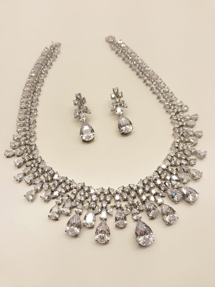 Elegant American Diamond Necklace Set with silver plated brass metal, emanating undeniable sparkle and brilliance, perfect for any special occasion