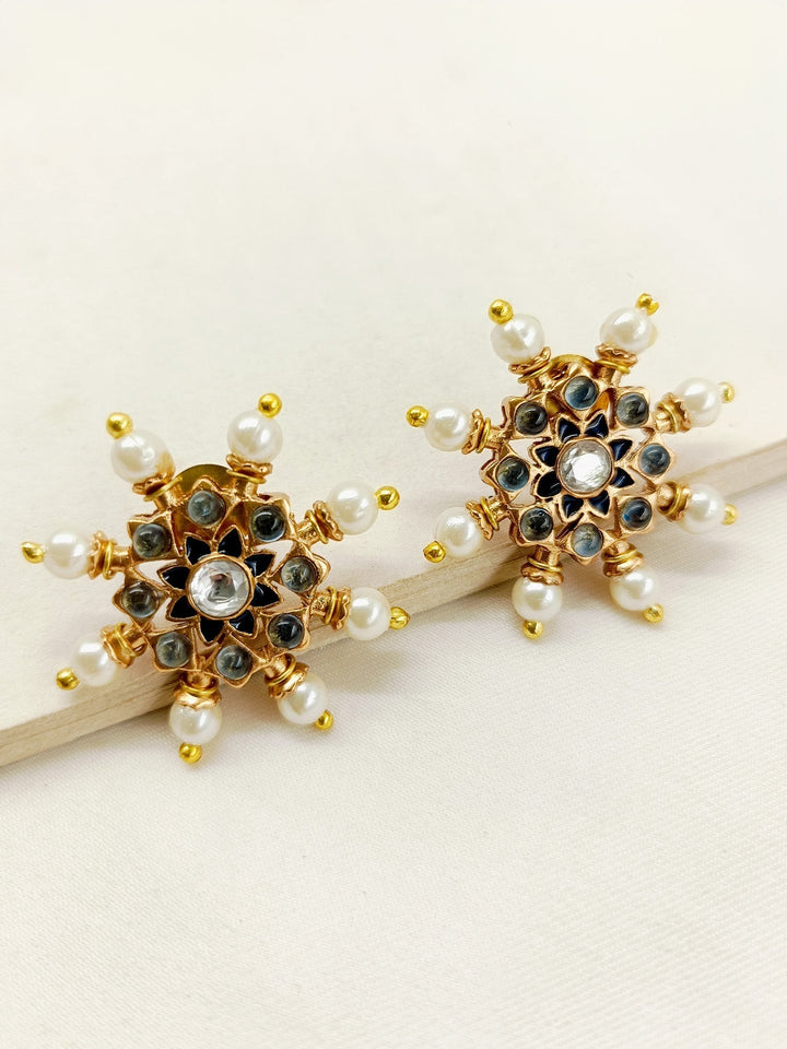 Close-up of a pair of Kalpana Navy Blue Gold Plated Meenakari Tops featuring beautiful traditional pearls and matte gold with turquoise navy blue stones