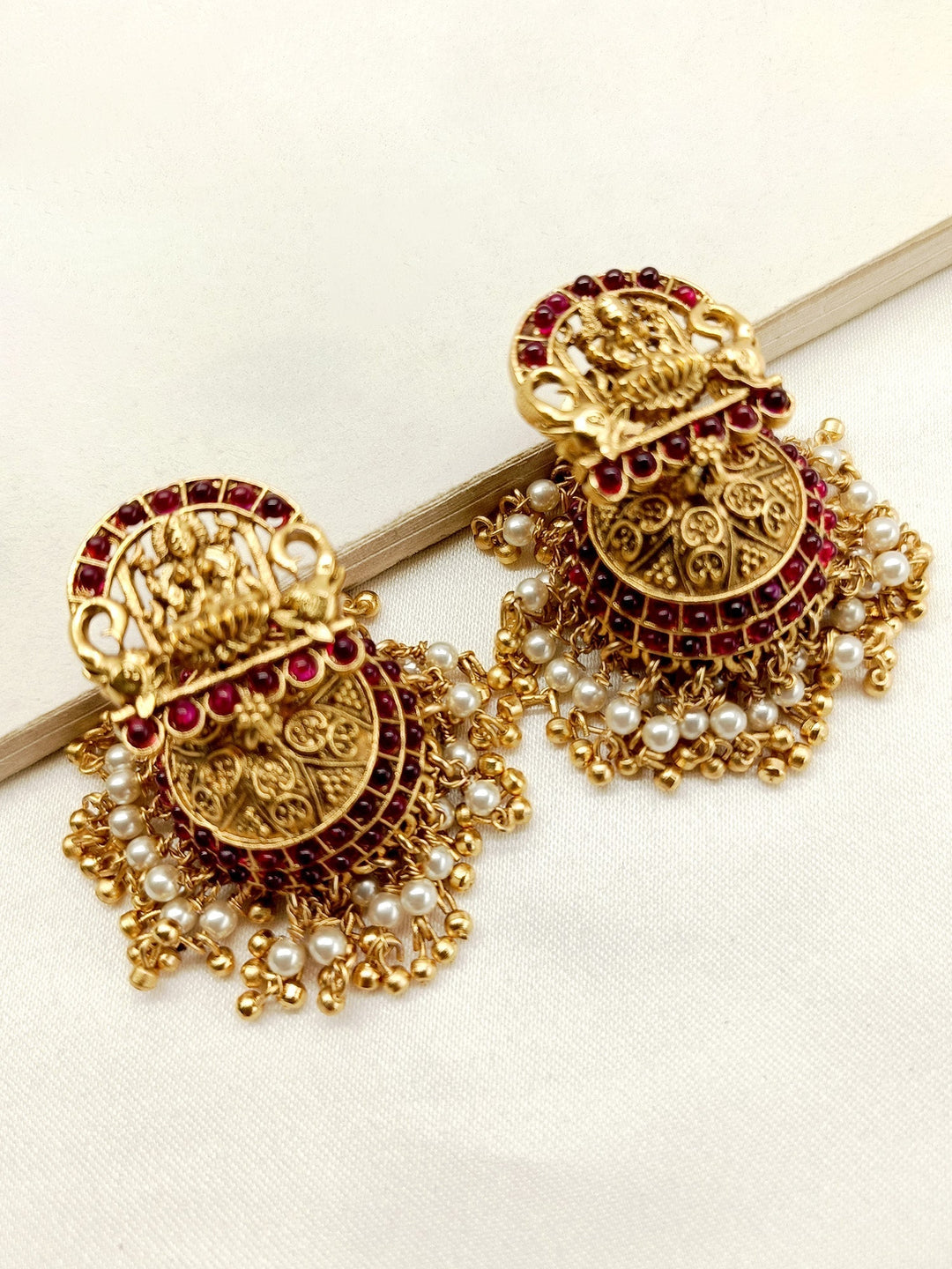 Gold plated antique temple jhumki earrings with rose pink stones