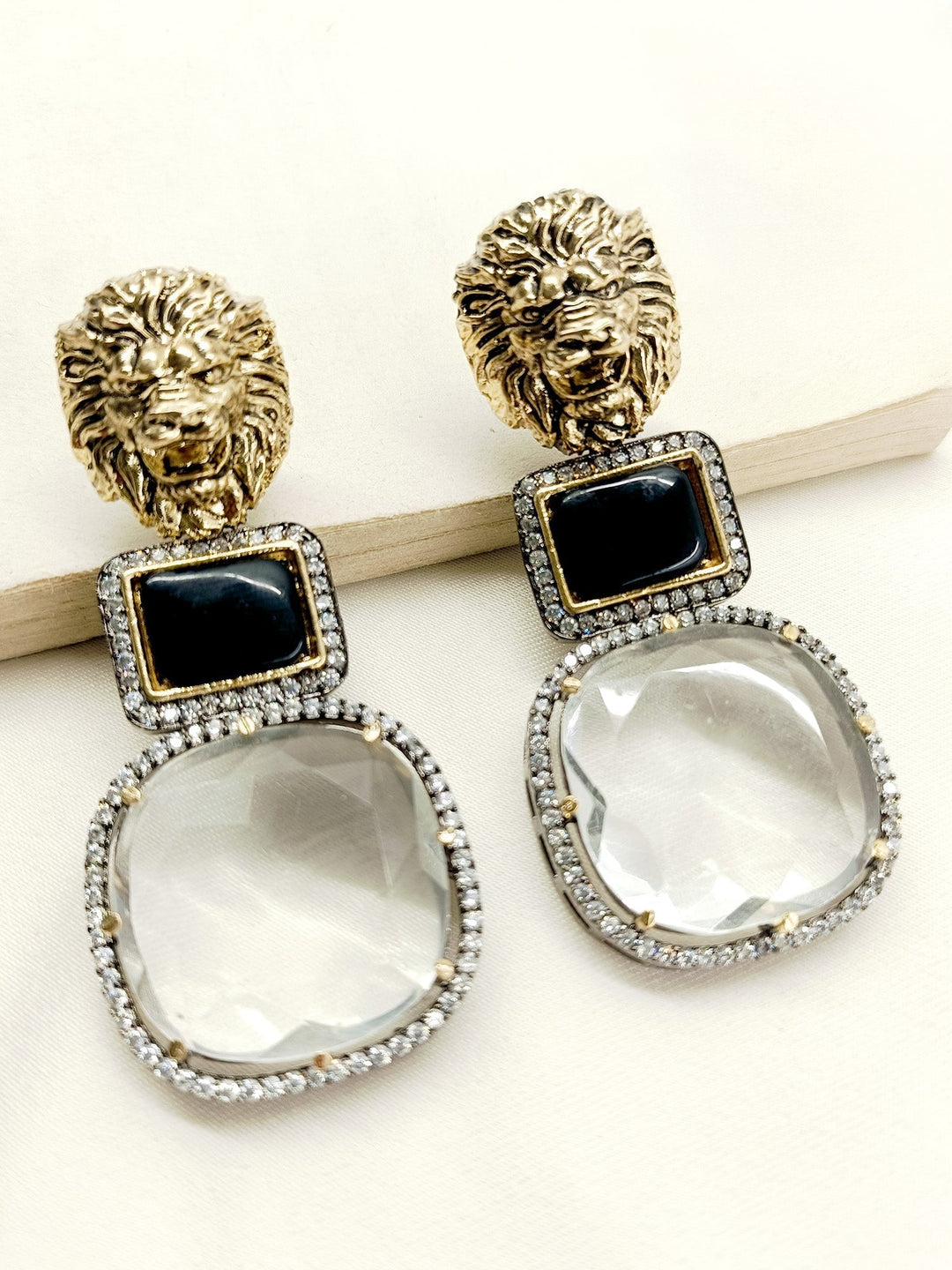 Black Victorian earrings with lion motifs, made with black polish brass metal and accented with American diamond setting, perfect for any occasion 