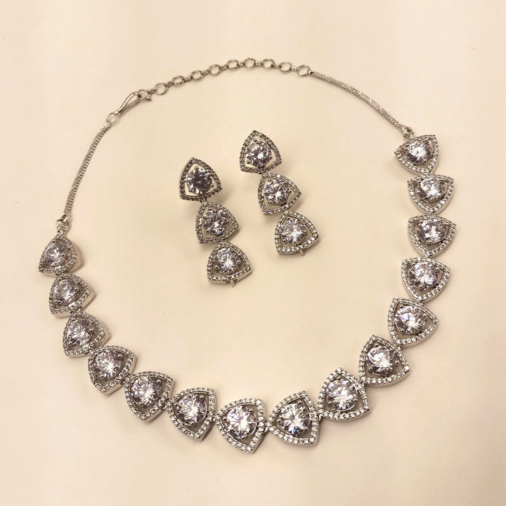  Exquisite Zaara Silver Plated Semiprecious White Stone American Diamond set with detailed silver plating and dazzling American Diamond embellishments