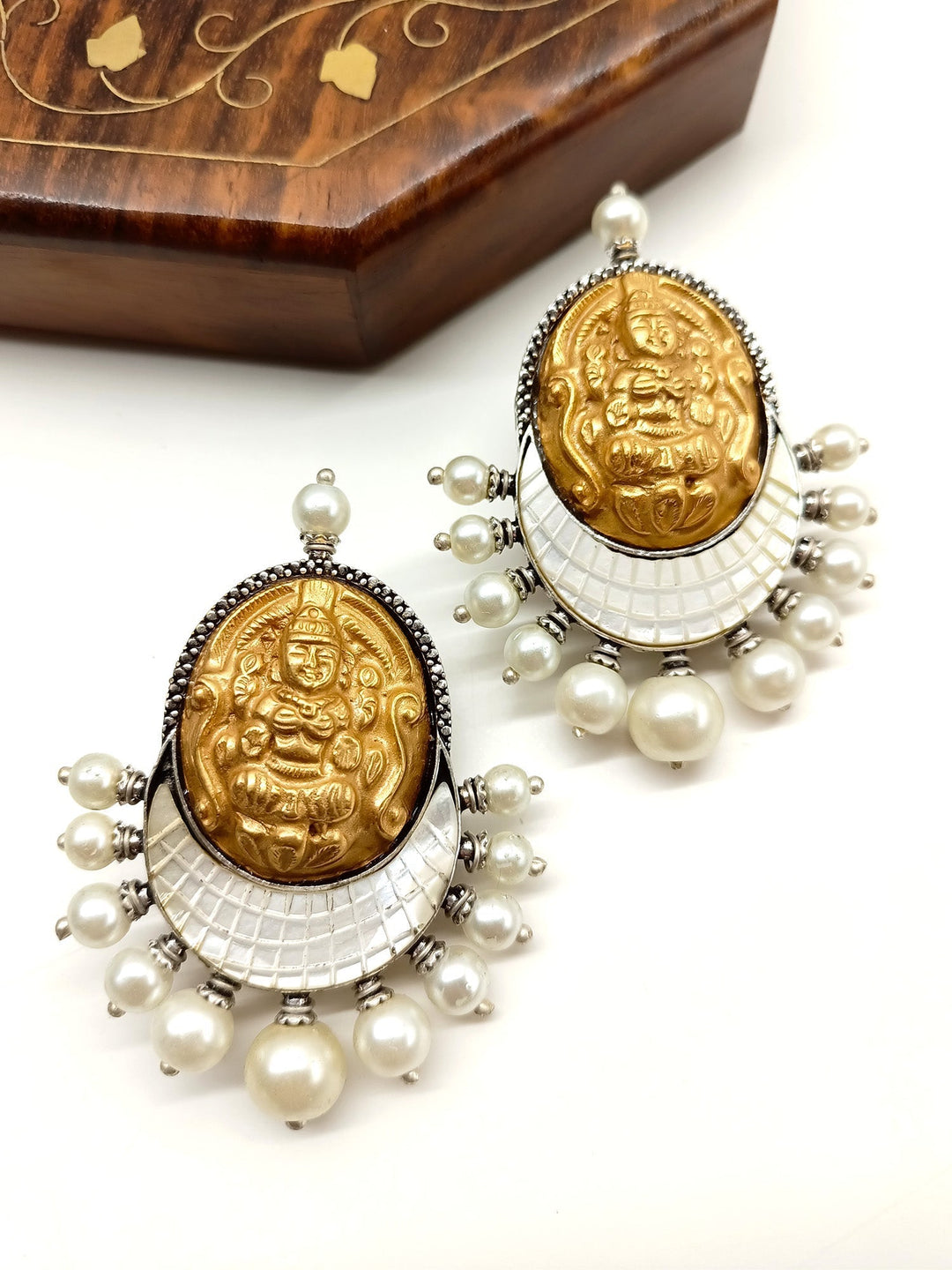 Pratibha White Temple Boutique Earrings crafted from white carved stones with oxidized silver brass metal 