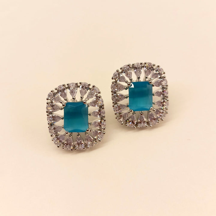  Beautifully crafted studs with sky blue stone and silver plating