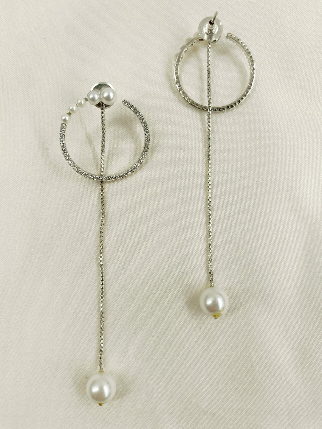 Beautiful and versatile earrings with delicate pearl detailing and a unique style
