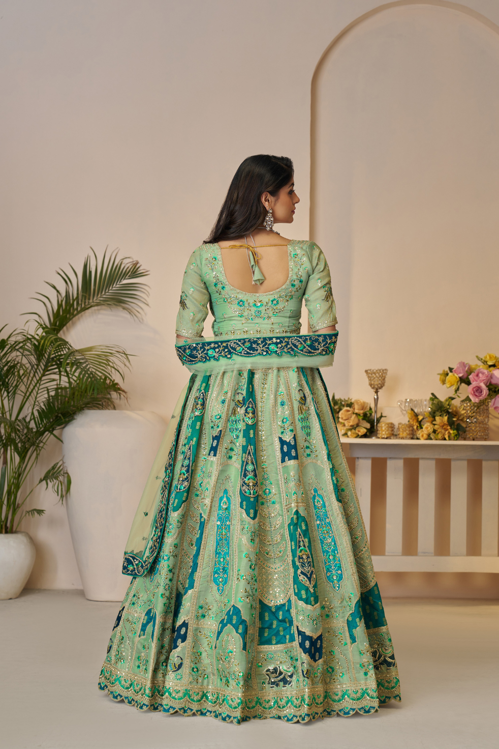 Rajsi Haathi Collection: Green Peacock-Embroidered Bridal Lehenga - qivii