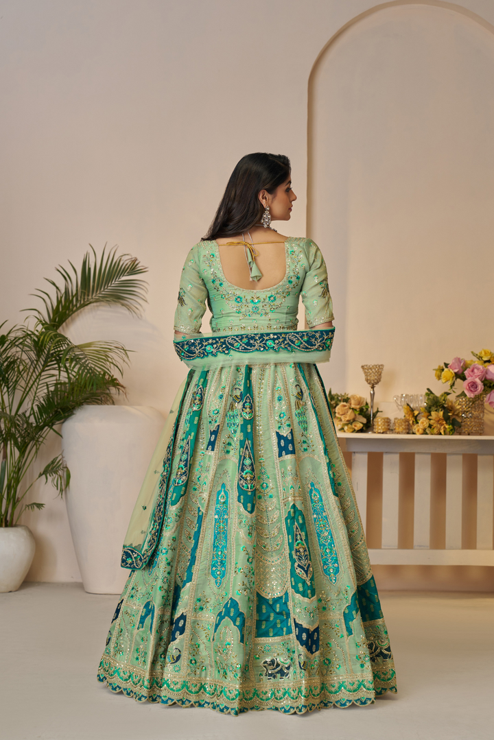 Rajsi Haathi Collection: Green Peacock-Embroidered Bridal Lehenga - qivii