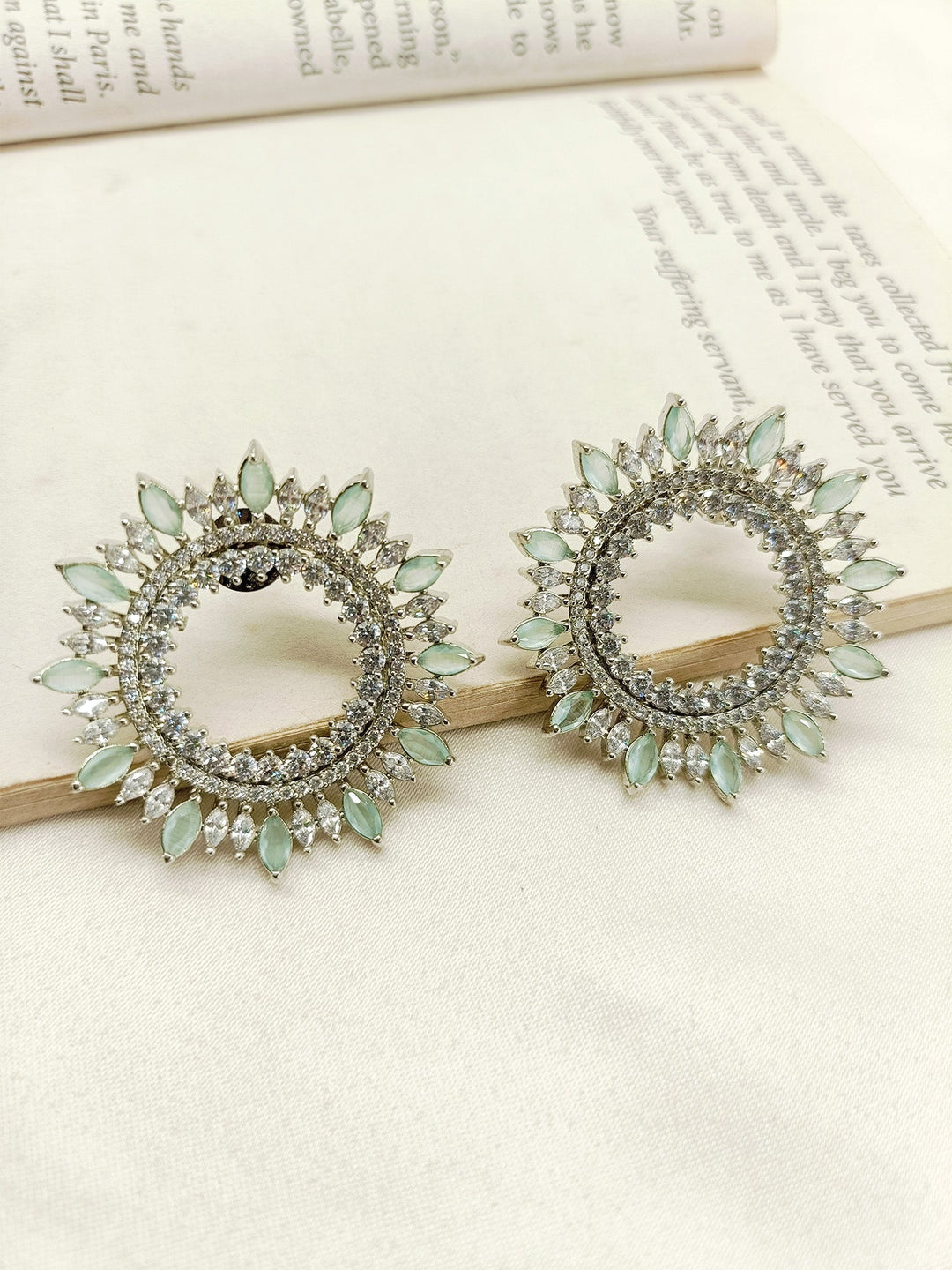 Close-up view of Monika Light Green American Diamond Silver Plated Tops with beautifully designed mint green marquise round shapes and sparkling American diamonds on silver plated brass metal 