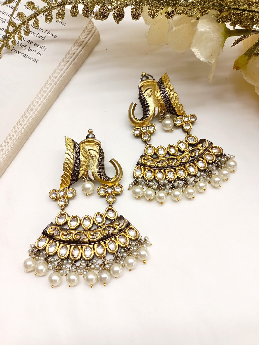 Beautiful gold and green elephant-shaped Kundan earrings by Kamalika