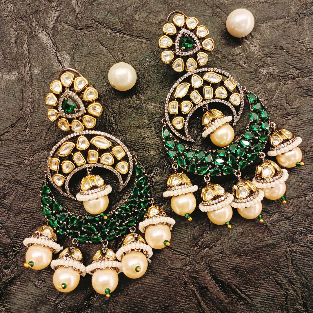 Mishika Green Rhodium Plated Victorian Earrings - Elegant and intricate design with green gemstones