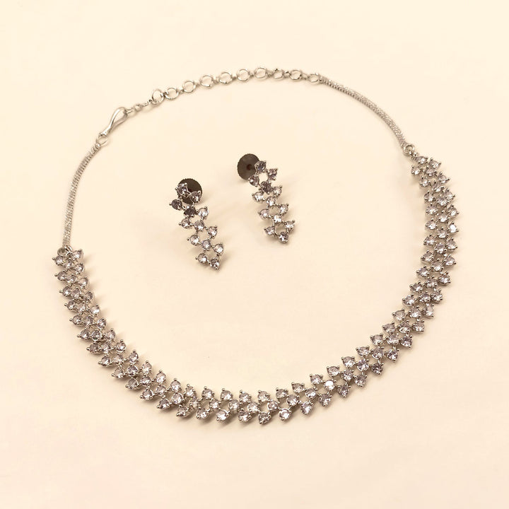  Exquisite Tejaswini Silver Plated Semiprecious White Stone American Diamond set featuring delicate silver plating on brass metal