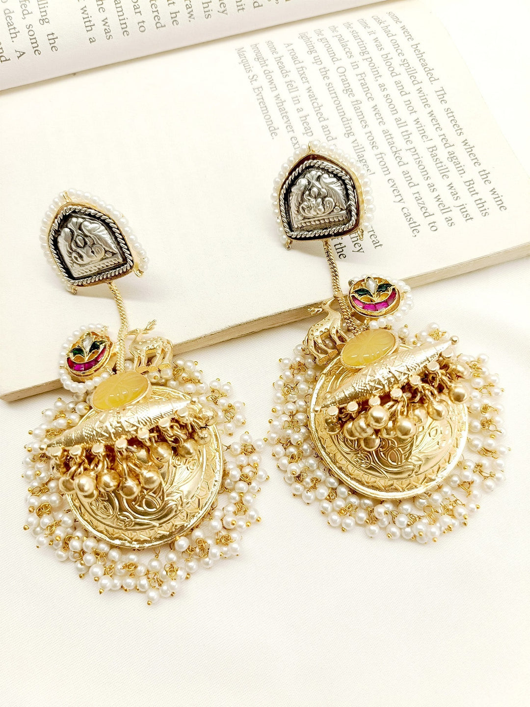Gold plated brass metal jhumki with delicate pearl and golden ball hanging 