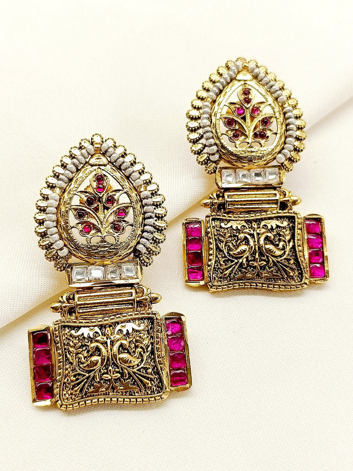 Close-up of Kalash Maroon Boutique Earrings with Gold Plated Brass Metal and Kundan Stone 