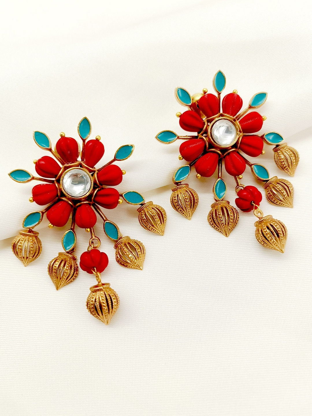 Eka Red Boutique Tops featuring traditional boutique styling and made with antique gold plated brass metal, perfect for making a statement with unique design and quality materials 