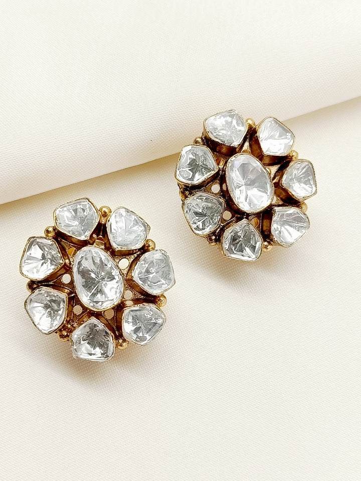 Pair of elegant White Kundan Tops with American Diamonds and back clip-on feature, crafted in gold plated brass metal 