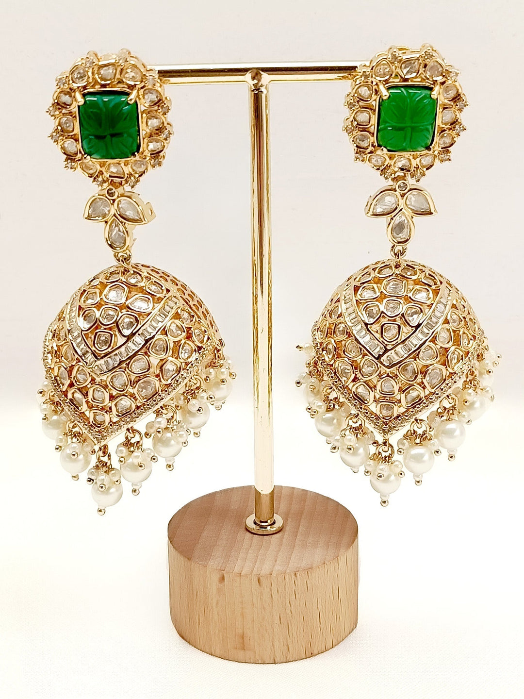 Gold plated brass Kundan Jhumki earrings with green stone and pearl hanging 