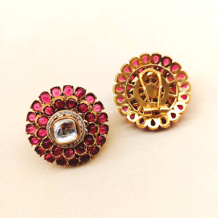 Gorgeous rose pink and gold plated Kundan Tops adorned with traditional Kundan, colored stones, and American Diamonds