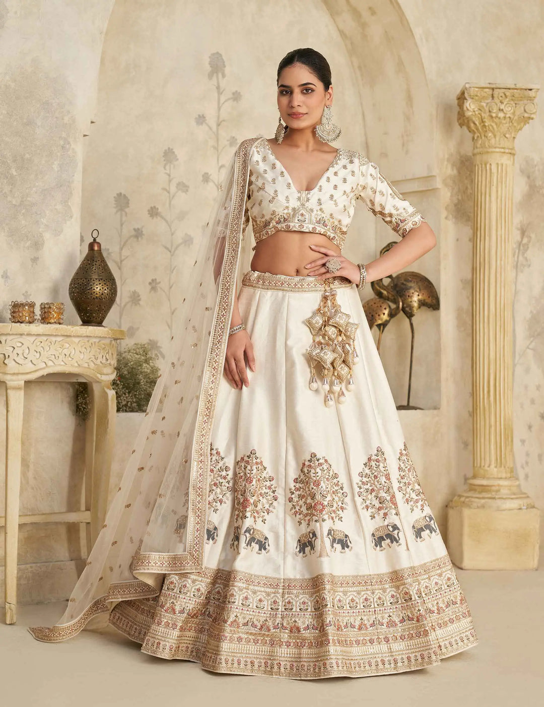 Cream Lehenga with Intricate Elephant Zari Work - qivii