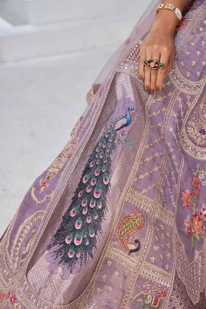 Dusky Purple Silk Lehenga With Peacock Feather Motifs - qivii