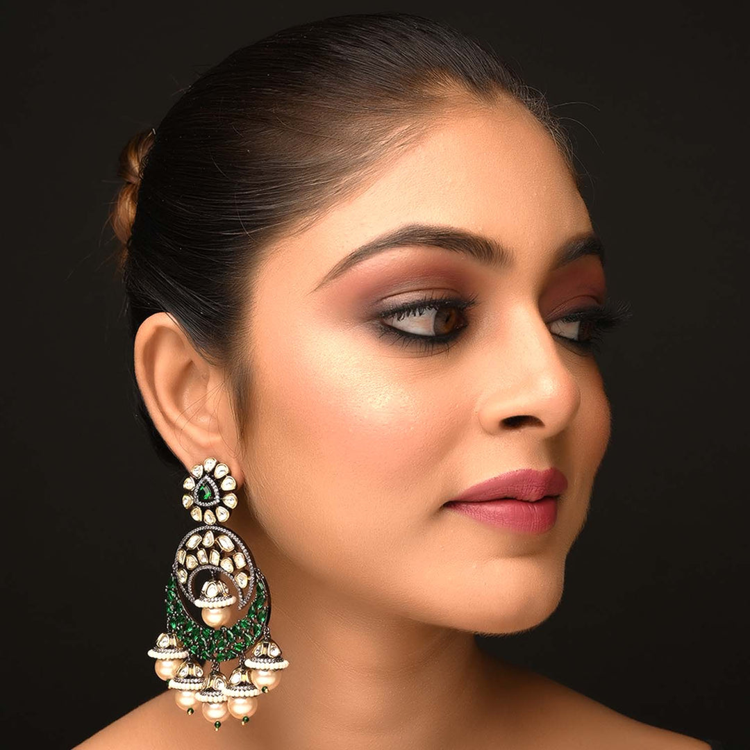 Mishika Green Rhodium Plated Victorian Earrings with Intricate Filigree Design and Sparkling Emerald Gemstones