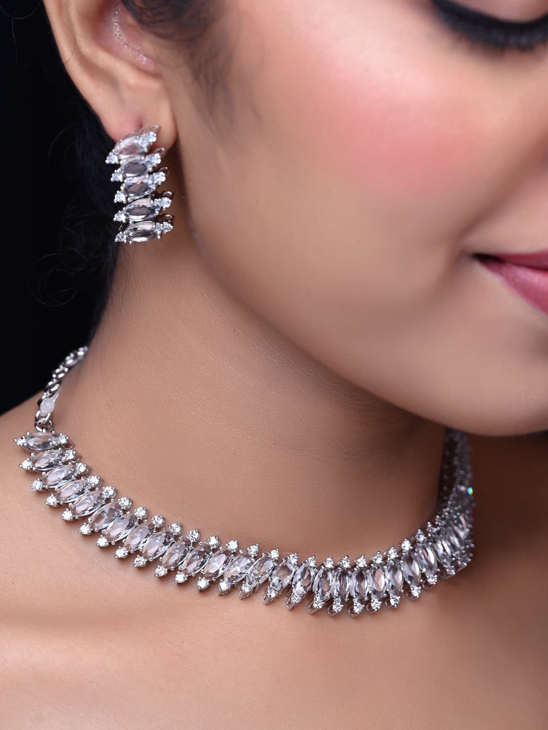  Elegant American diamond and stone necklace set with stylish earrings in silver plated brass metal 
