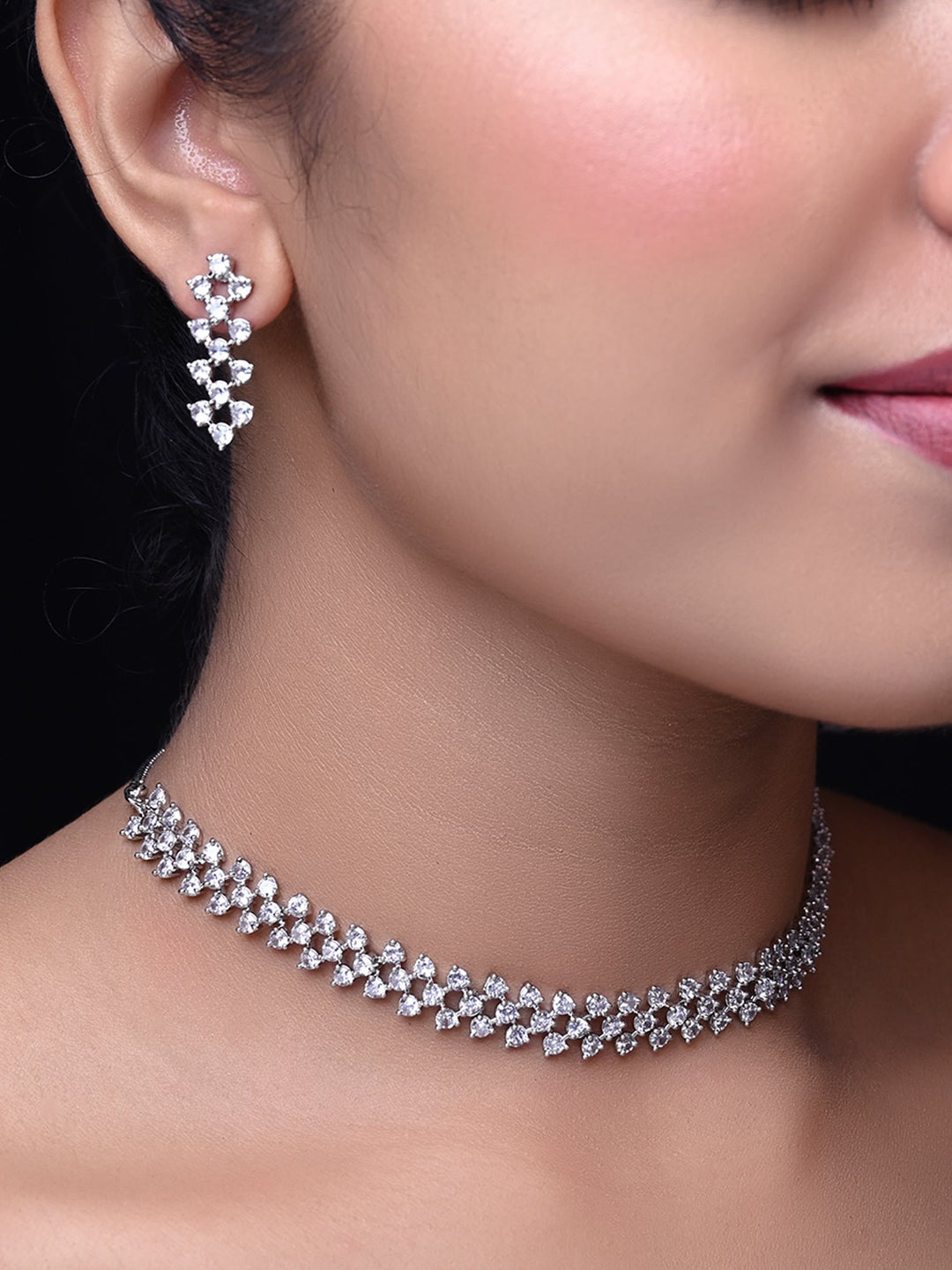  Beautifully crafted American Diamond set with sparkling white stones and silver plating on brass metal