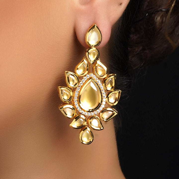 Exquisite gold plated earrings adorned with high quality Kundan and American diamond stones