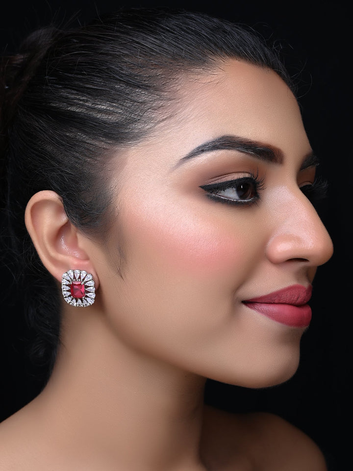 Radhika American Diamond Rose Pink Tops with Semi Precious Aqua Stone Studs and Silver Plated Brass Metal 