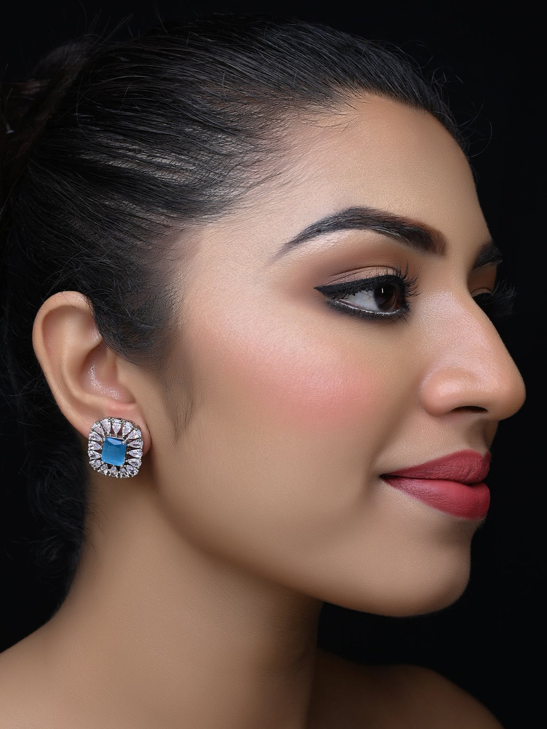 Close-up of Rakshita American Diamond Sky Blue Tops with brass metal and silver plating