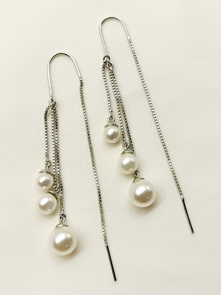  Timeless and versatile Rabhya White Sui Dhaga Pearl Earrings made from silver plated brass metal with stunning pearl, upgrading your jewelry collection with a touch of luxury