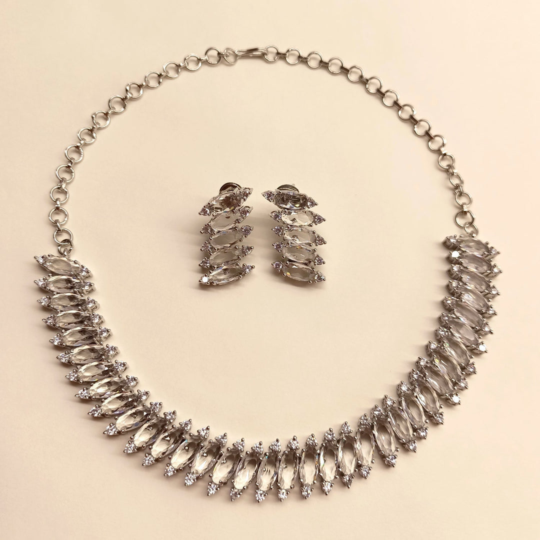  Beautifully designed silver plated necklace set adorned with American diamond and fancy cut shape stone 