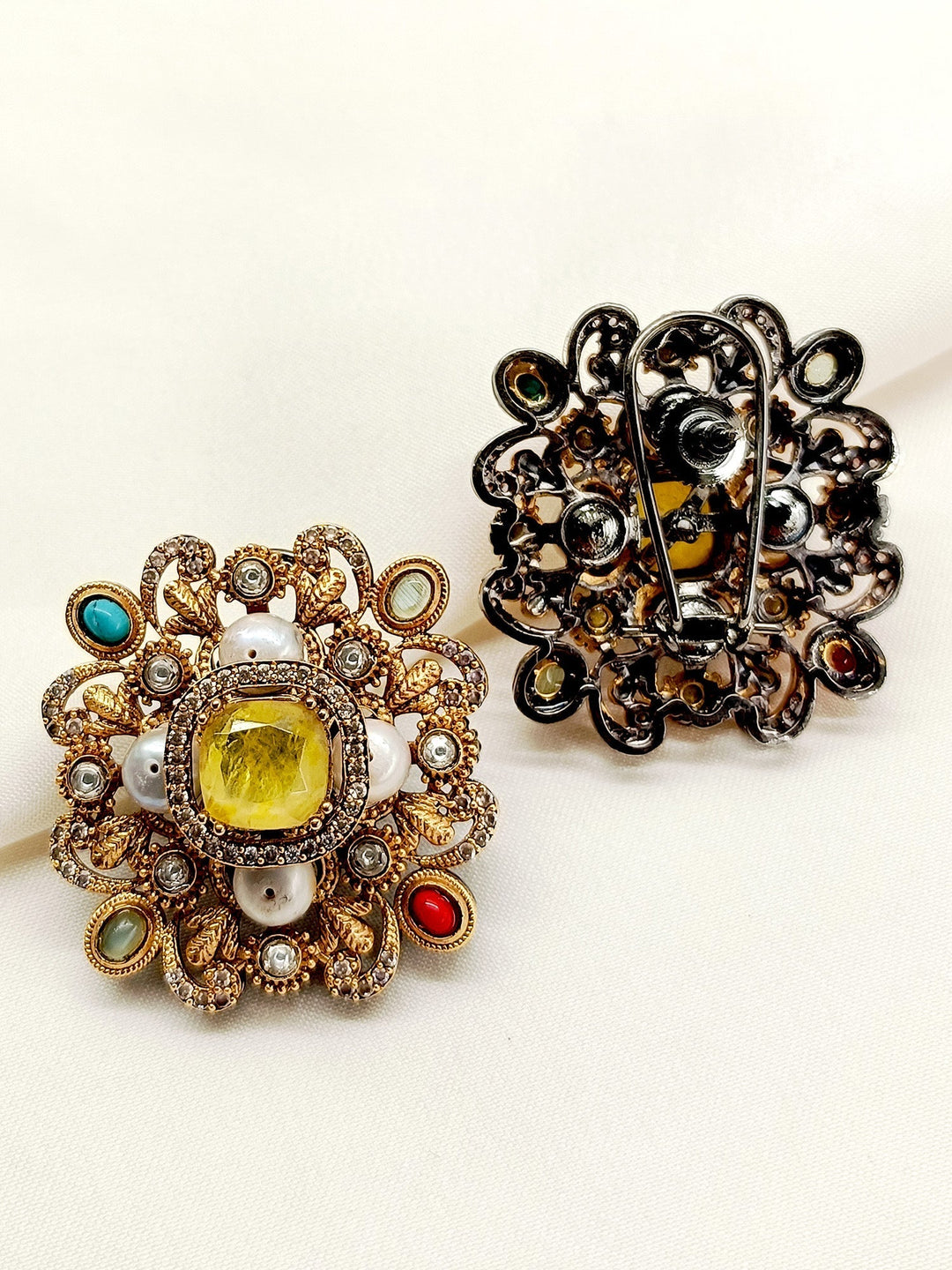  Elegant Viha Navaratna Victorian Tops with traditional craftsmanship, featuring intricate gold and black polish brass metal, and exquisite Navaratna stones back clip-on