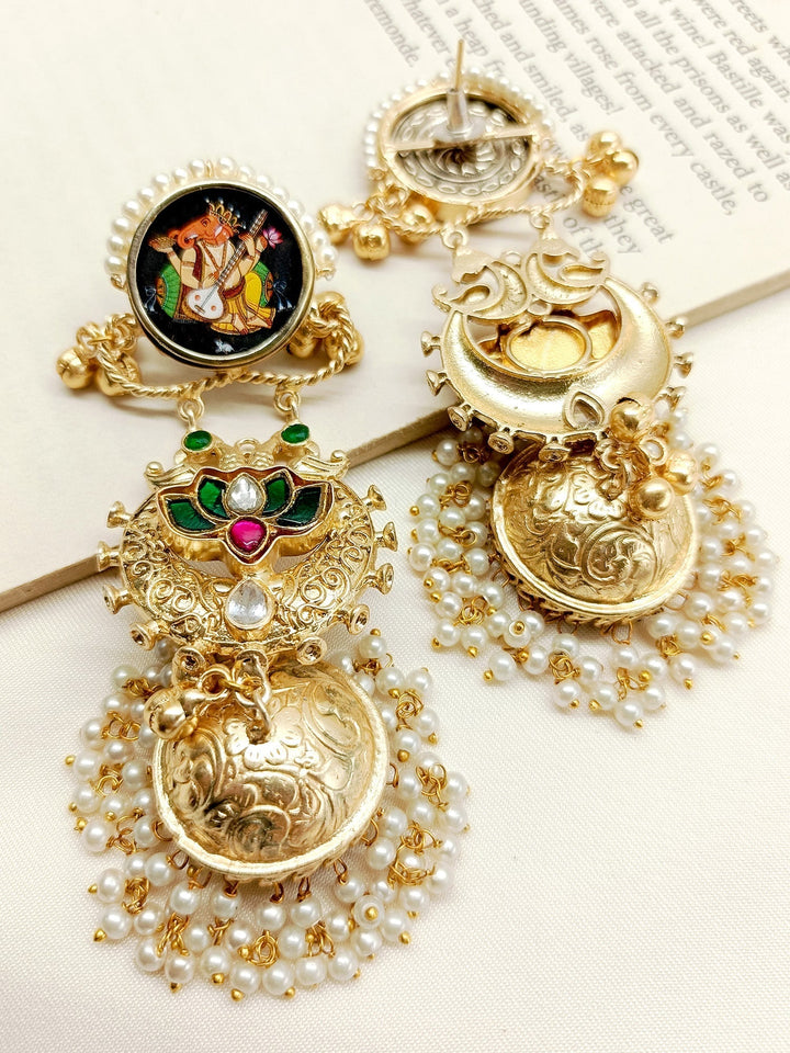 Gold and silver traditional Indian jhumki earrings from Kanika M & G Boutique