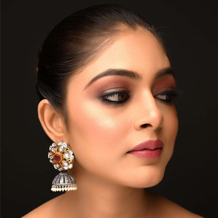 Silver oxidized jhumkis with gold texture and pearl hangings 