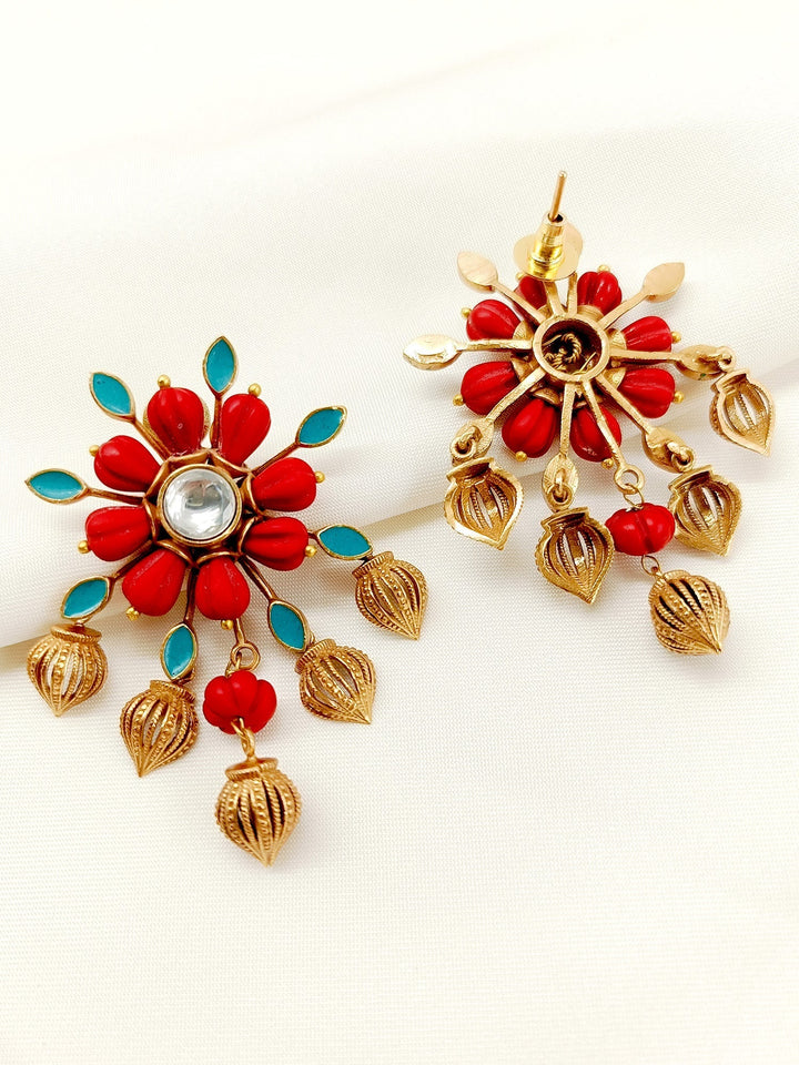  Upgrade your wardrobe with Eka Red Boutique Tops, featuring traditional boutique styling and made with antique gold plated brass metal for a unique and statement-making look