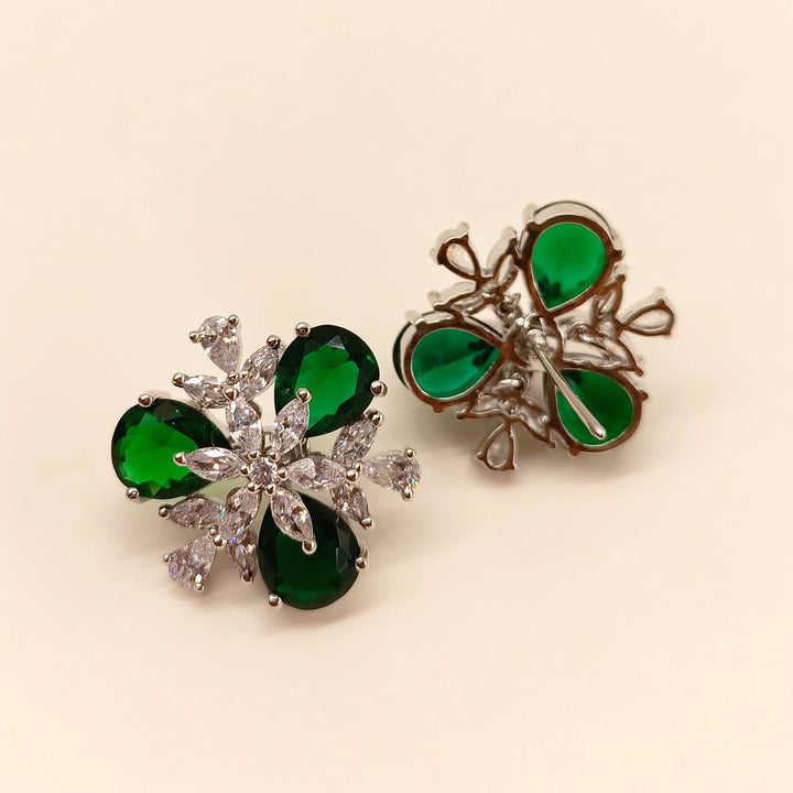 Stylish and elegant green emerald studs with American diamond detailing