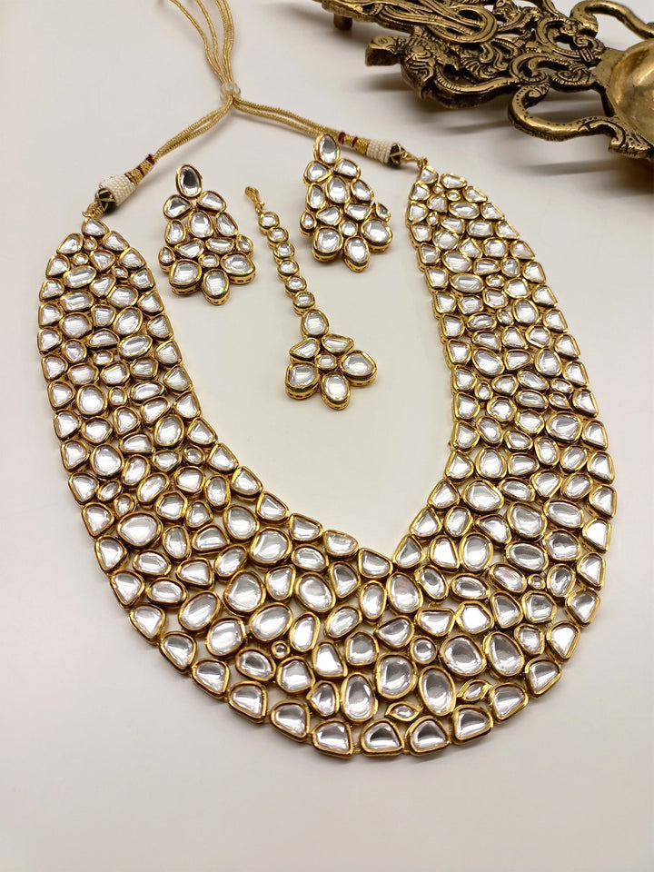 Sanober Kundan Necklace Set with intricate gold detailing and colorful gemstones